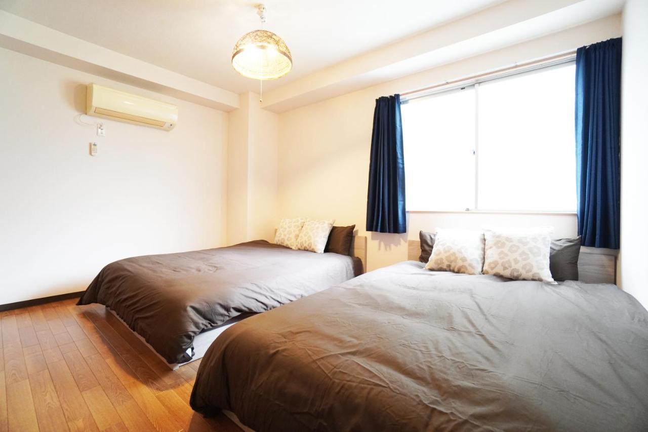 Apartamento Akimi Building Osaka Exterior foto