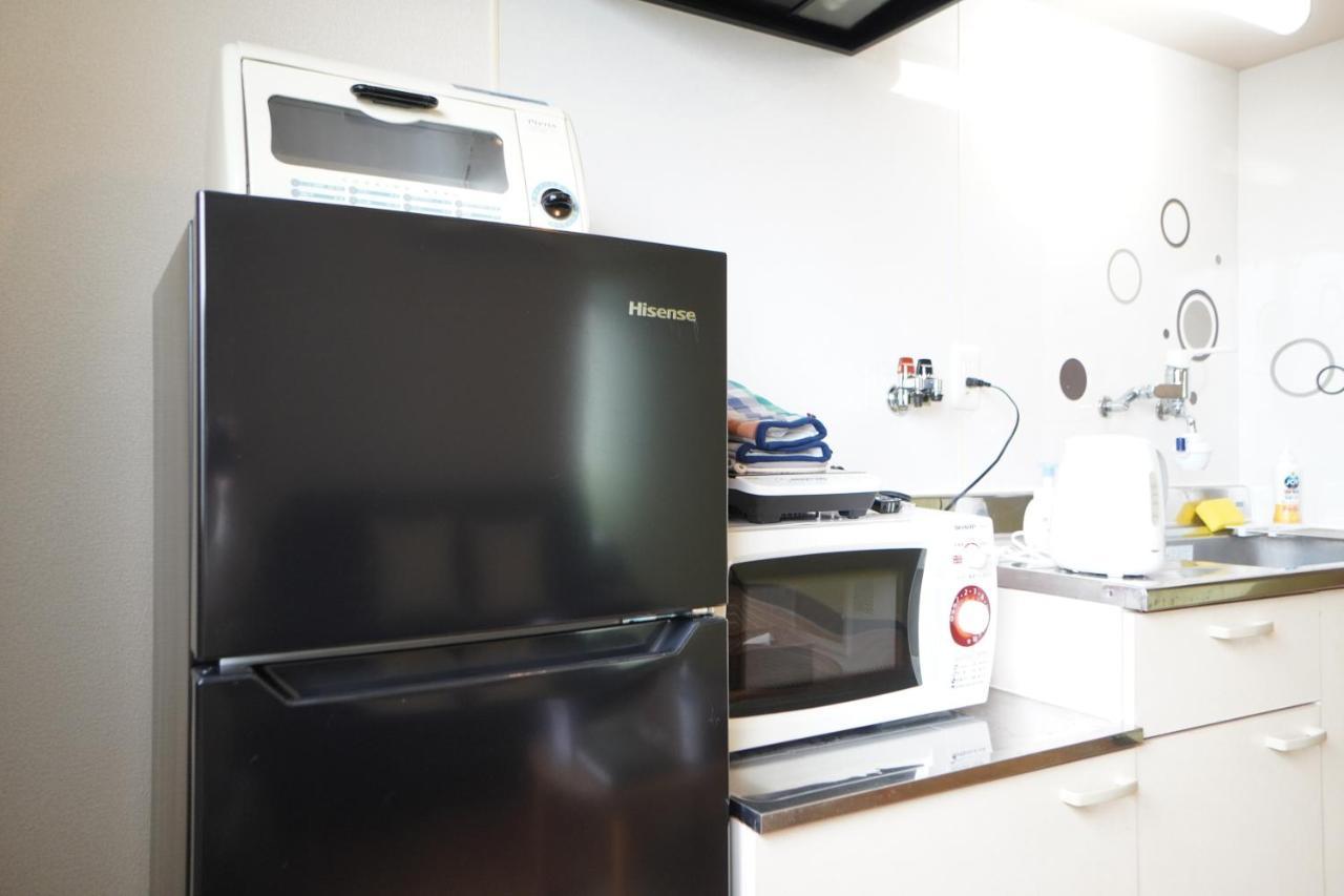 Apartamento Akimi Building Osaka Exterior foto